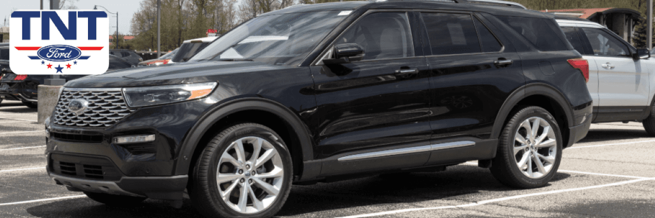 A certified used Ford Explorer parked in front of TNT Ford’s dealership in Red Oak, Iowa