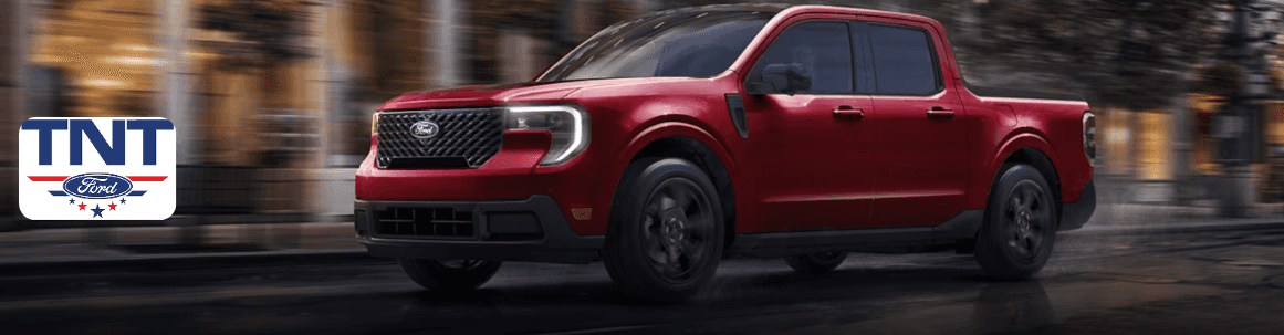 Red Pre-owned Ford Maverick pickup truck displayed at TNT Ford dealership in Red Oak, IA