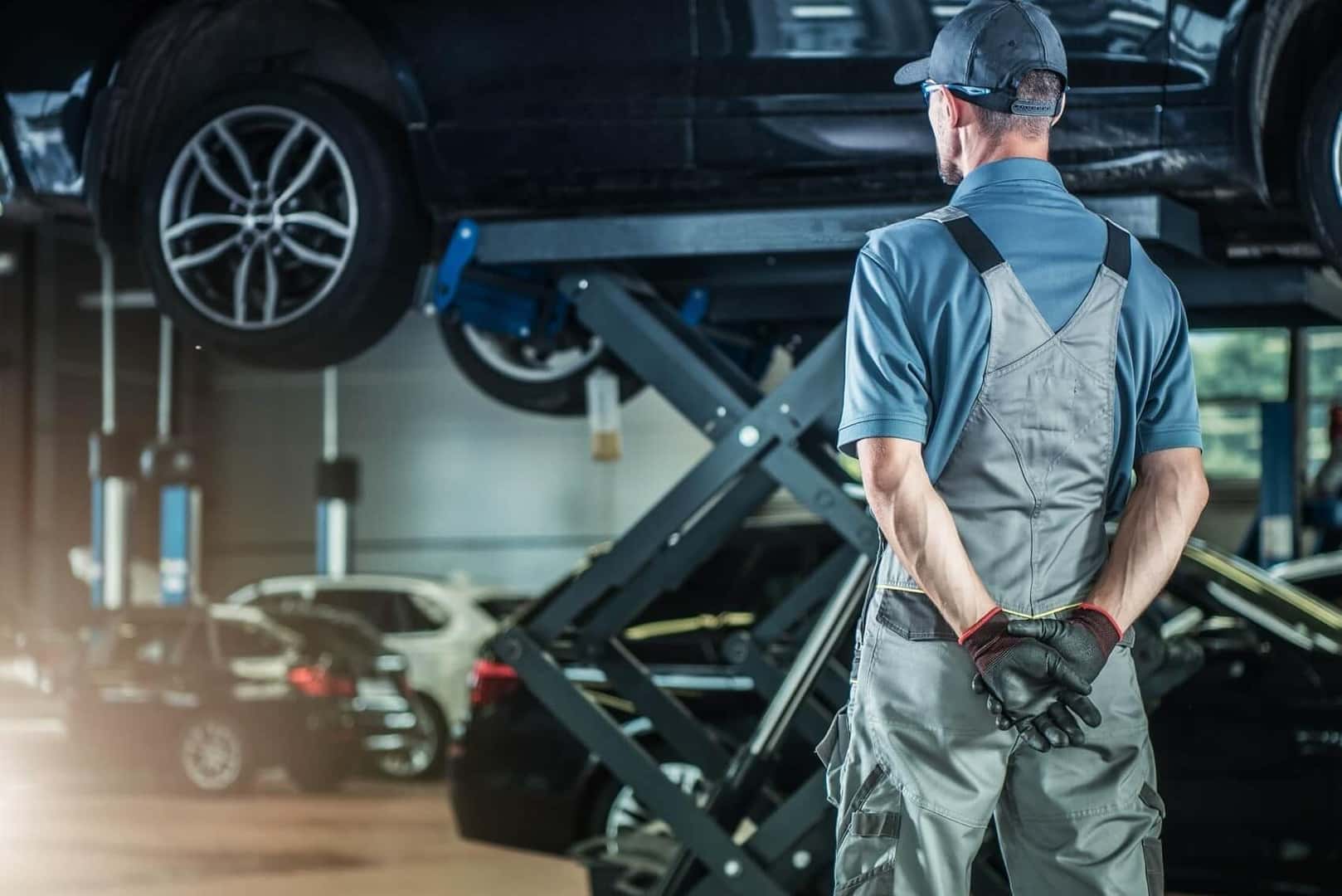 Ford Mechanic about to work on vehicle in service department