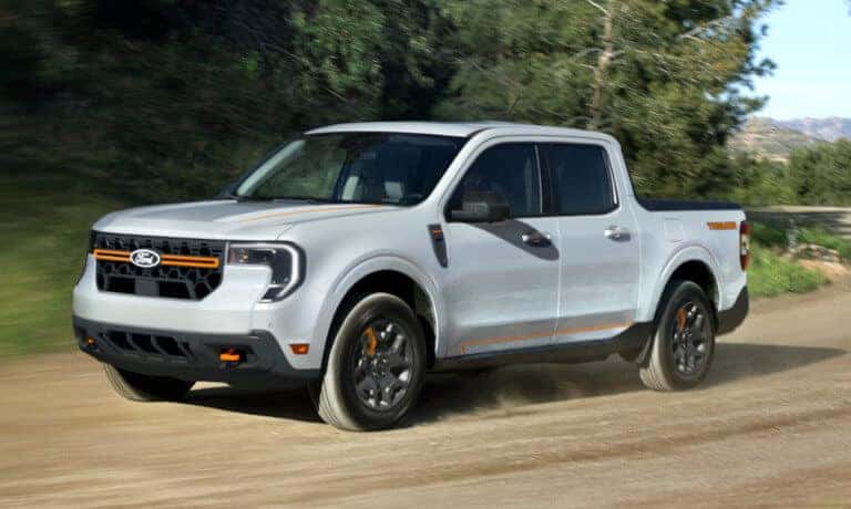 2026 Ford Maverick driving on dirt road