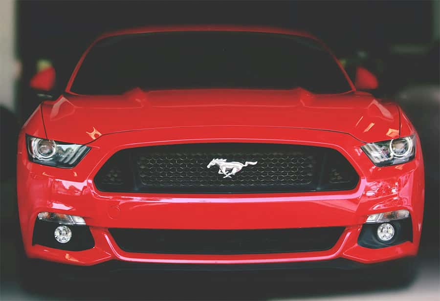 Red Ford Mustang front view