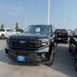 2025 Ford Expedition on our Kalispell Ford lot, behind it are some Ford F-150s