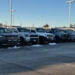 Various used vehicle brands on the Kalispell Ford lot on a chilly morning in the Flathead Valley