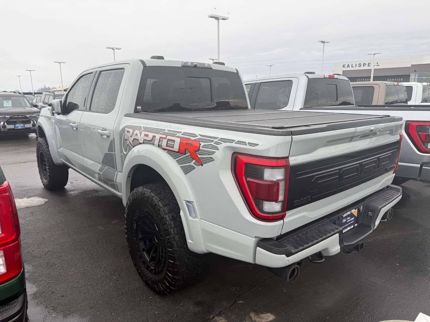 Used Ford Raptor on the Kalispell Ford lot in the Flathead Valley with a hard tonneau cover on
