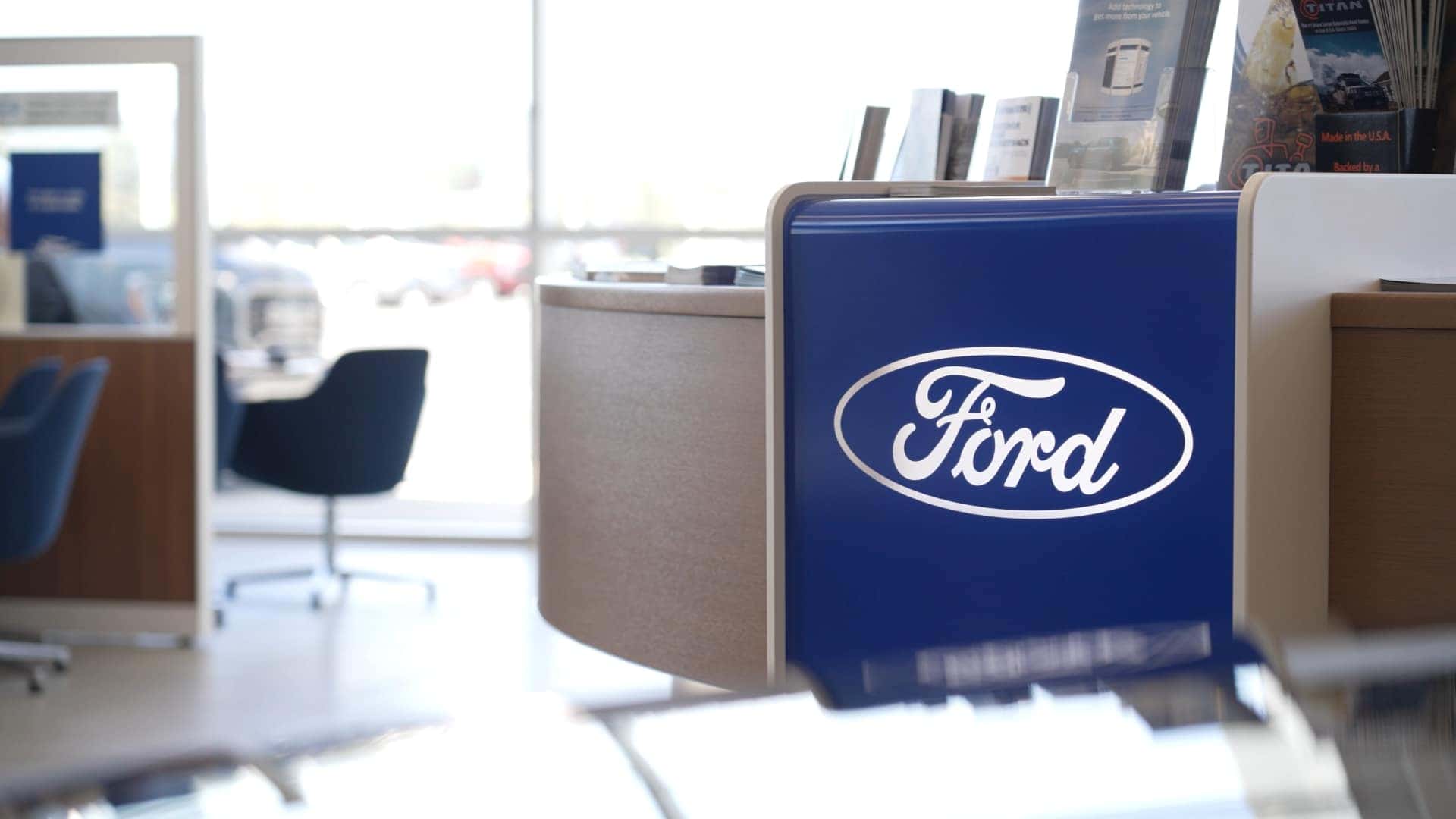 The Ford logo on a desk in the Kalispell Ford showroom
