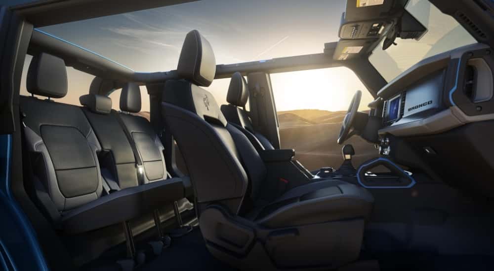 The black interior of a 2025 Ford Bronco for sale.