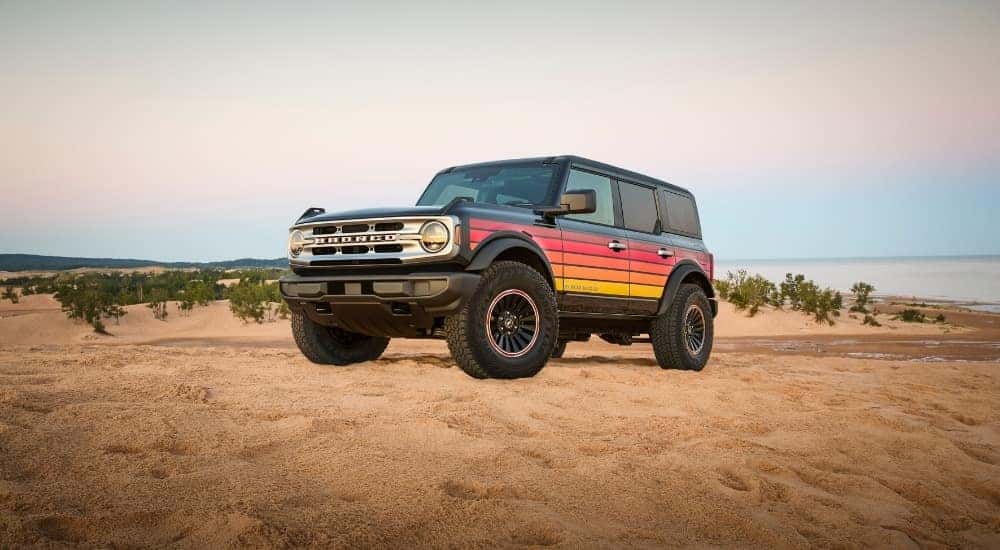 A grey 2025 Ford Bronco Free Wheeling parked off-road.