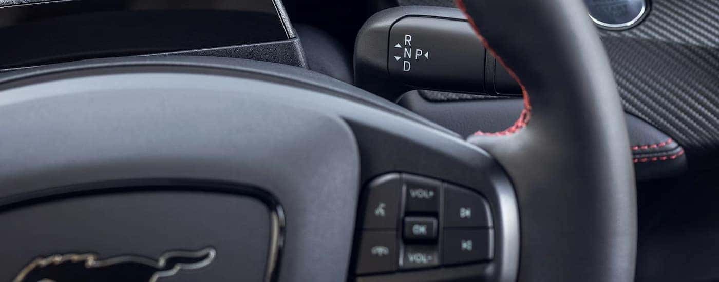 A close up of the steering wheel in a 2025 Ford Mustang Mach-E.