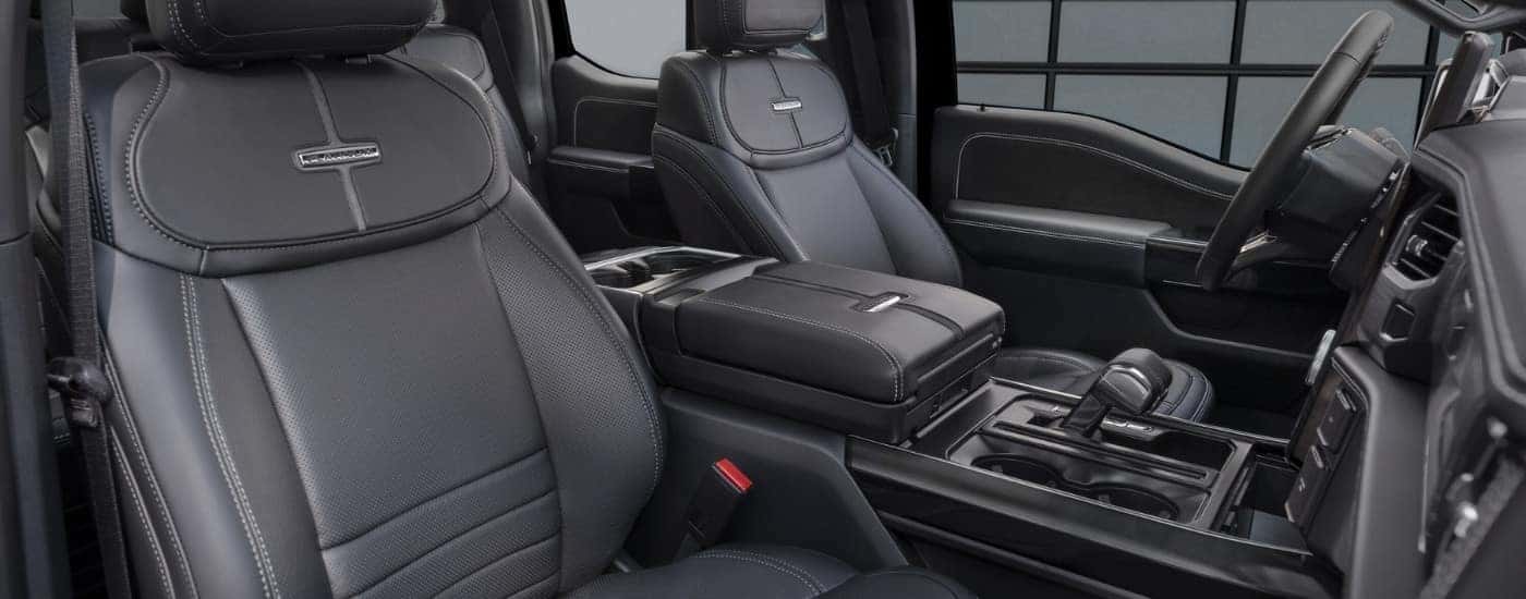 Black leather seats in a 2025 Ford F-150 Lightning Platinum.