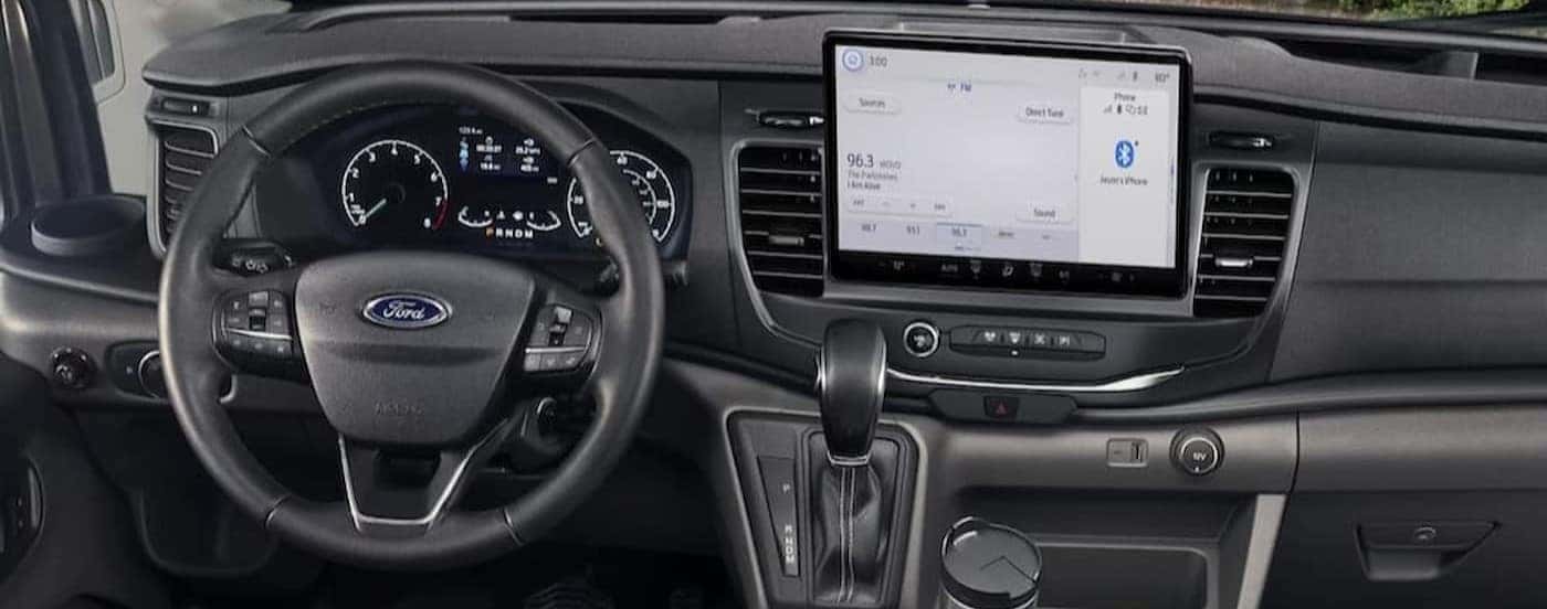 The black dash in a 2024 Ford Transit for sale near San Jose.