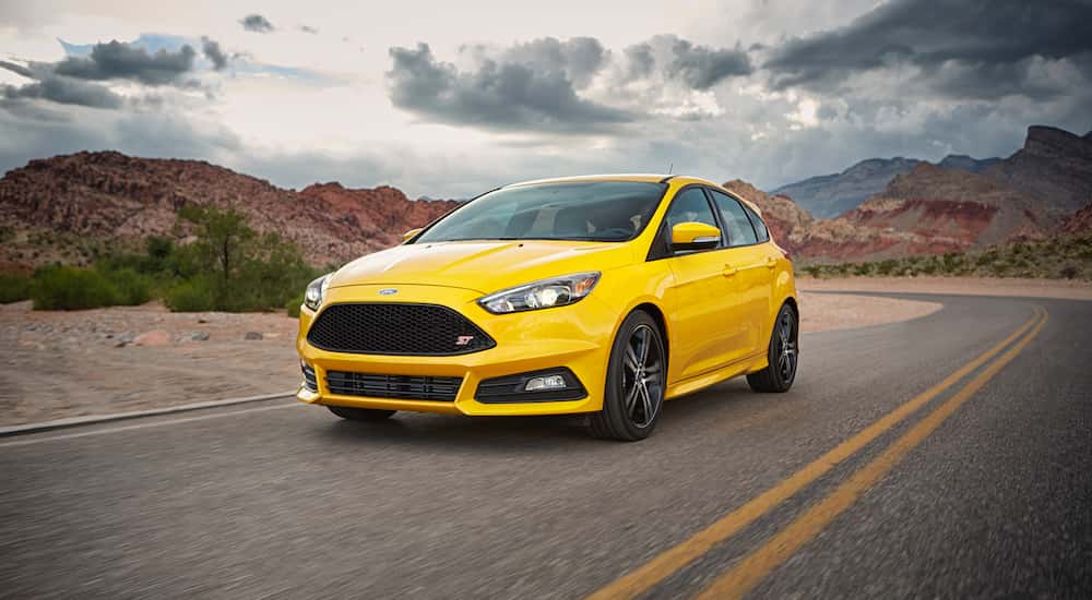 Yellow 2017 Ford Focus ST on the way to sell their car