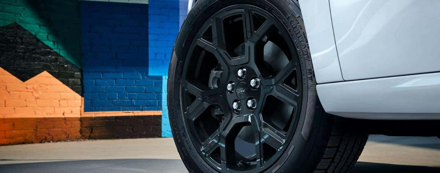 The black wheel base on a white 2026 Ford Maverick Lobo.