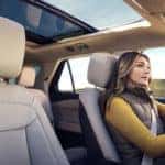 Woman driving Ford Explorer