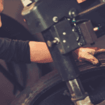 ford tire technician performing service
