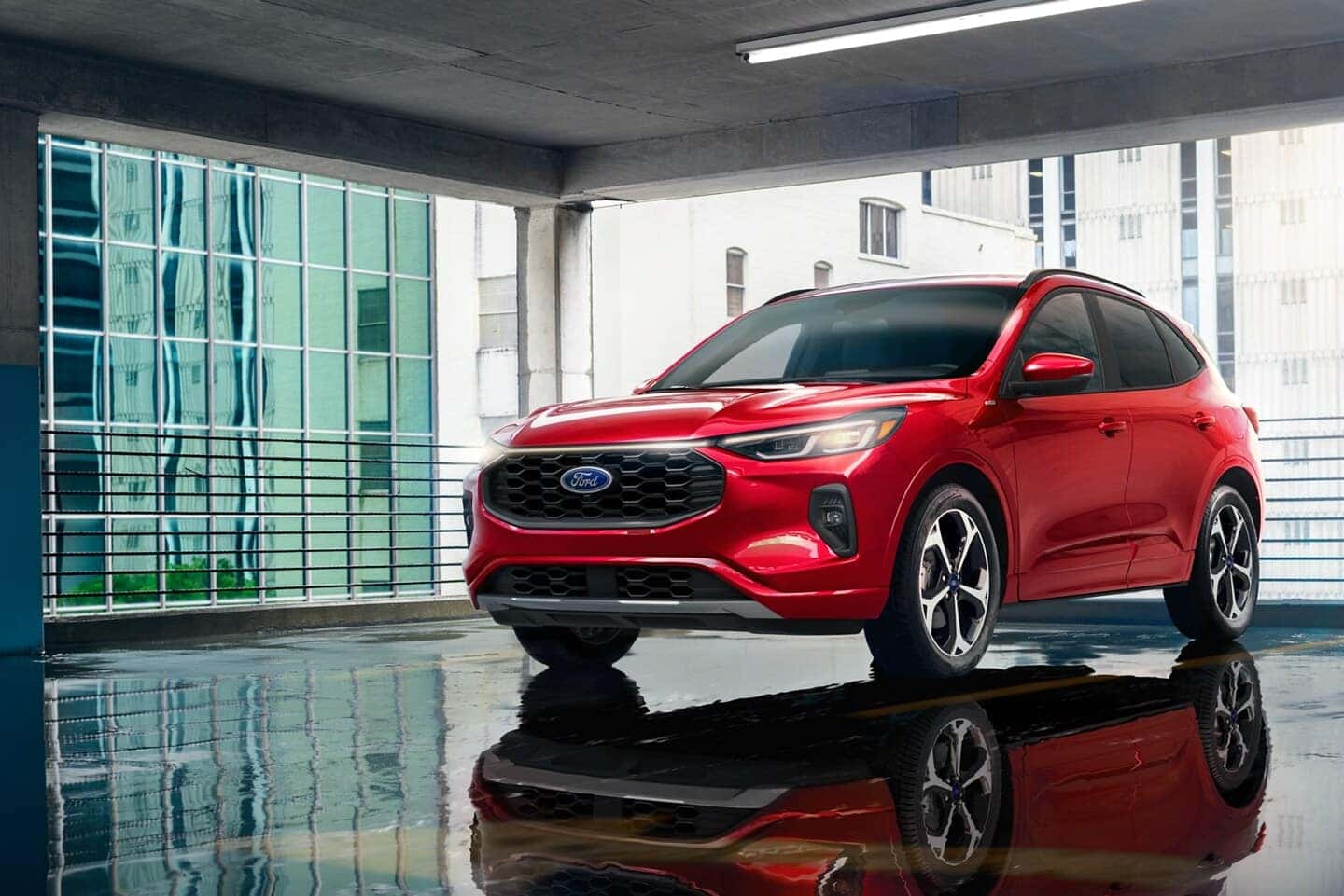 A red 2025 Ford Escape parked indoors by a large window