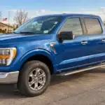Blue used Ford F-150 crew cab parked on the Belle Fourche Ford lot