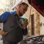 Ford technician performing an oil change