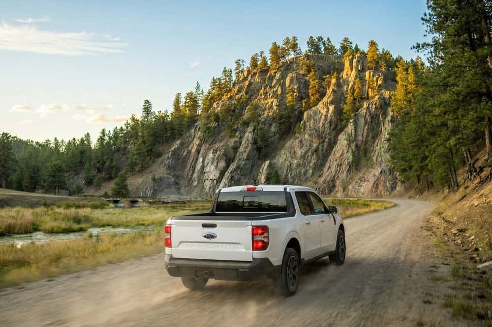 Ford Maverick navigating narrow Black Hills forest road