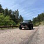 Green Ford Bronco Raptor in Vanocker Canyon in Sturgis