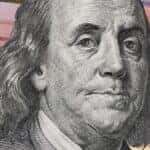 Ben Franklin portrait in front of Ford Mobile Service van