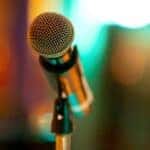 Microphone on stand with event venue in front