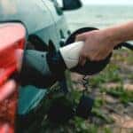 Hybrid vehicle being plugged in