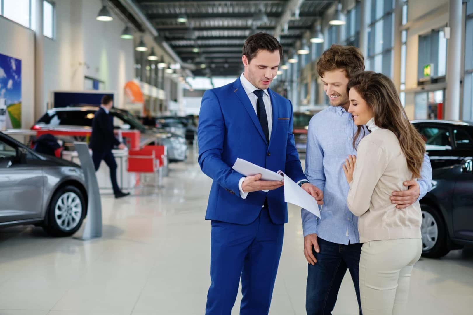 Ford Finance Team member discussing financing options with customers