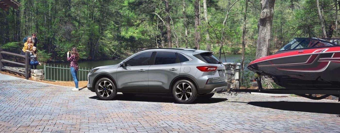 Grey 2024 Ford Escape parked near a lake