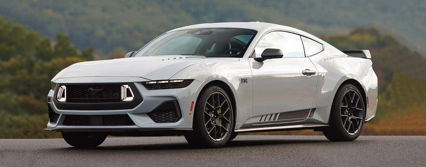 White 2026 Ford Mustang RTR parked at an overlook