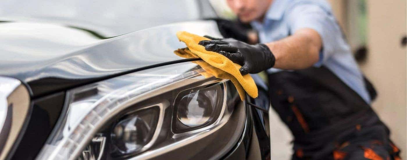 Maintenance being performed on a vehicle at a Ford Dealership.