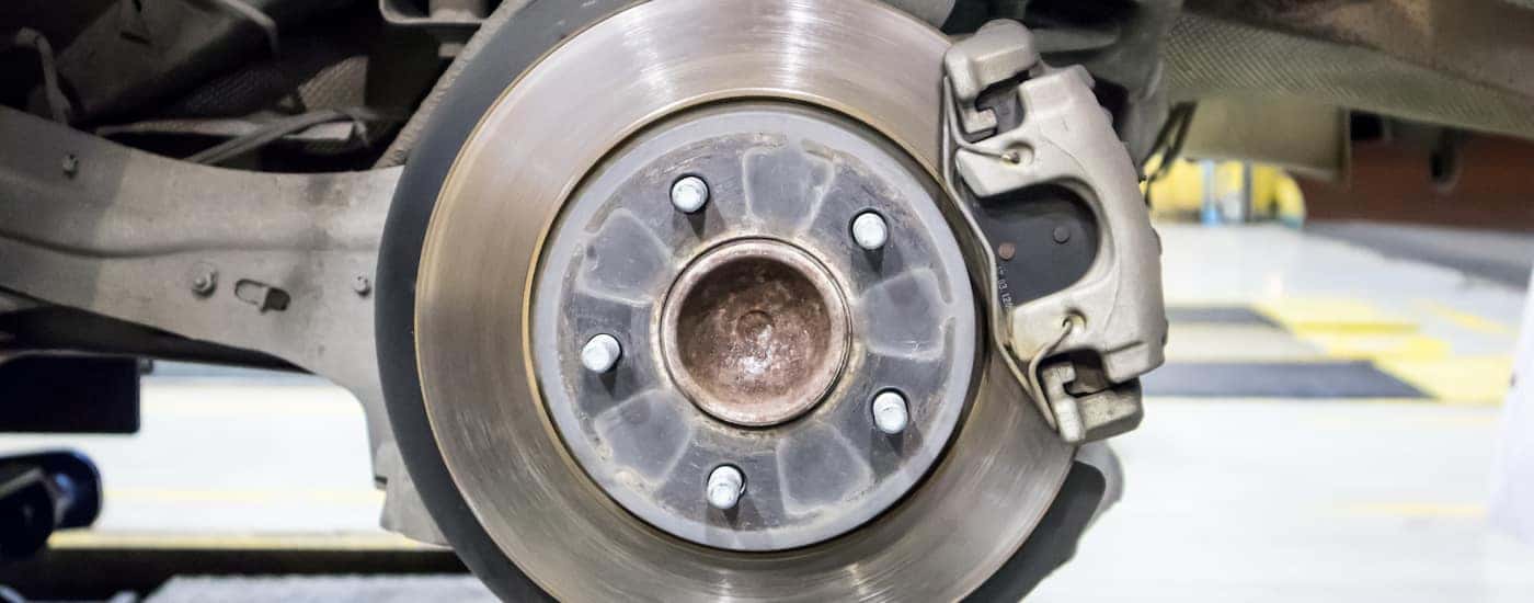 Close up of the brake pads on a vehicle.