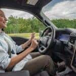 Woman driving the Ford BlueCruise