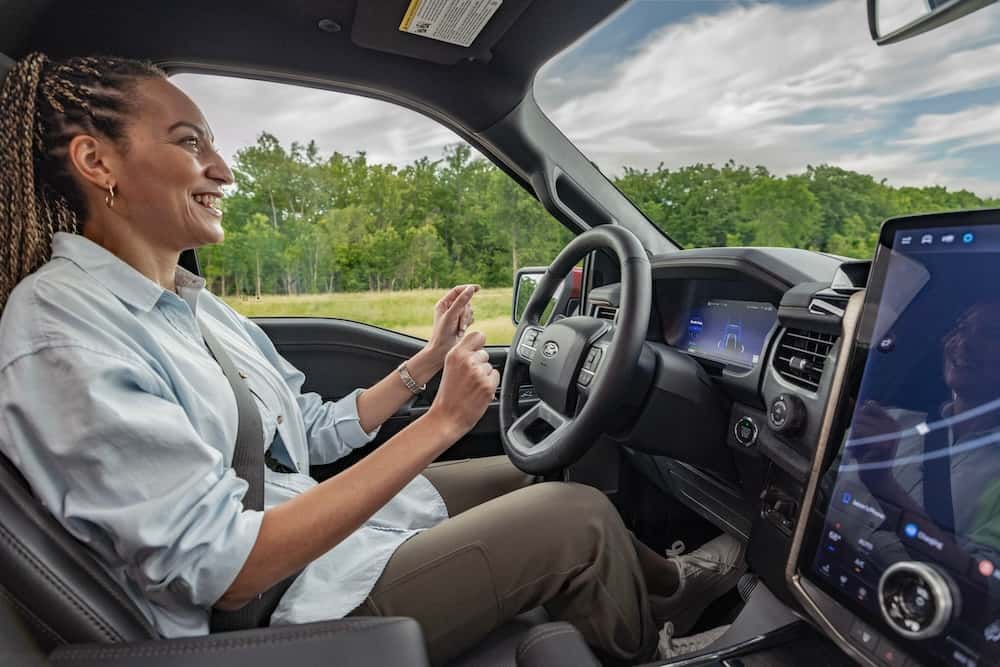 Woman driving the Ford BlueCruise