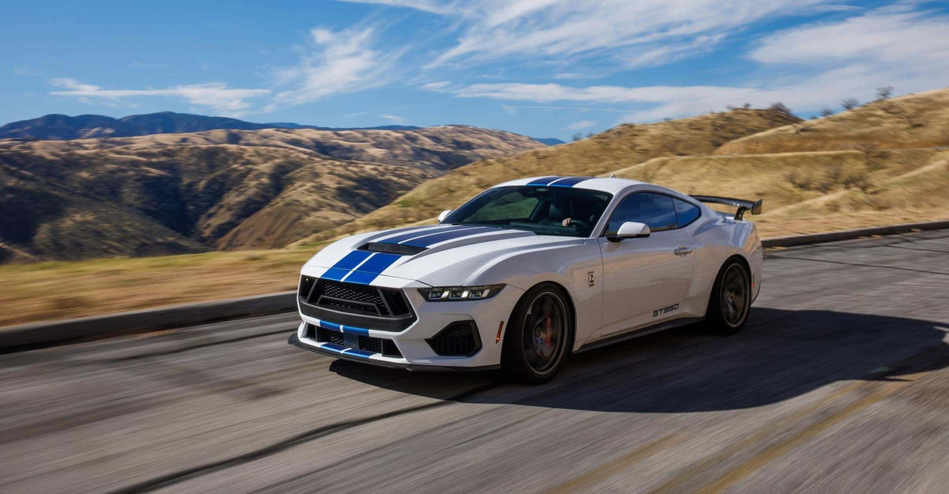 2025 Shelby GT350 white driving in mountains