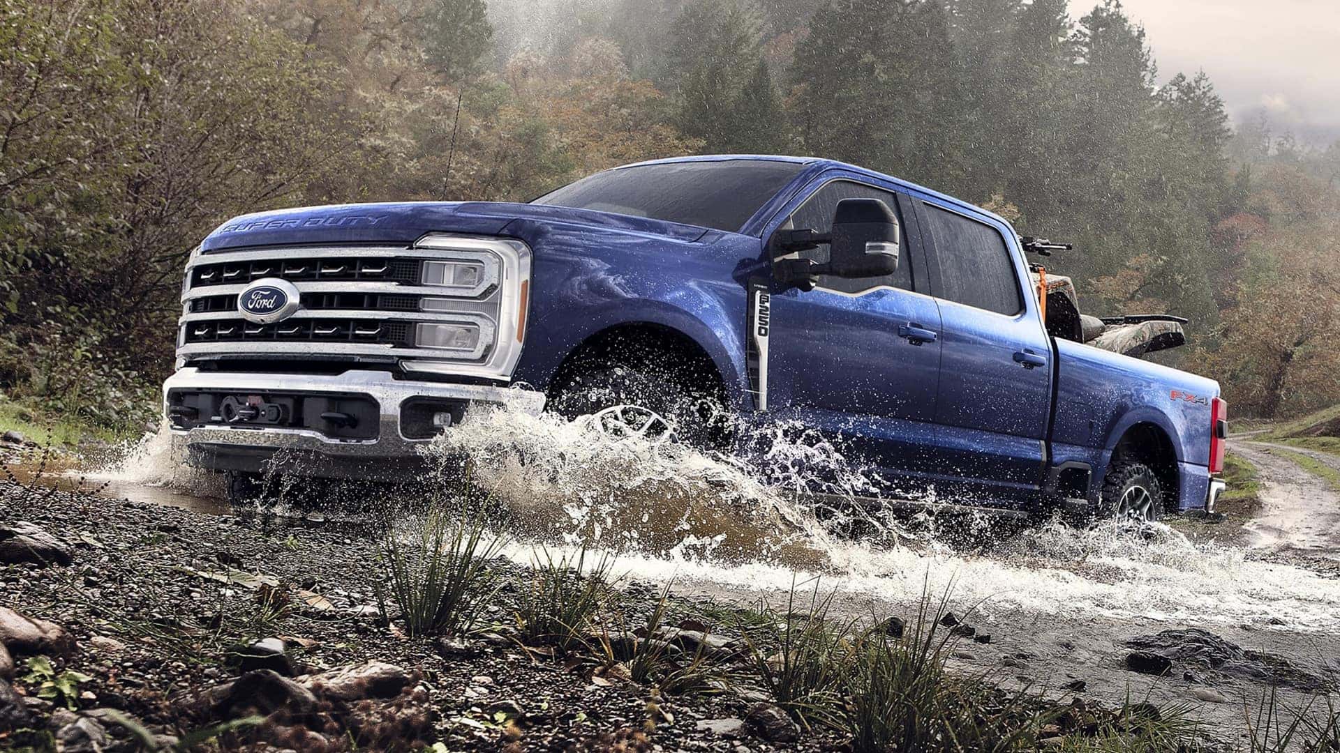 2026 Ford Super Duty Driving Through Puddle