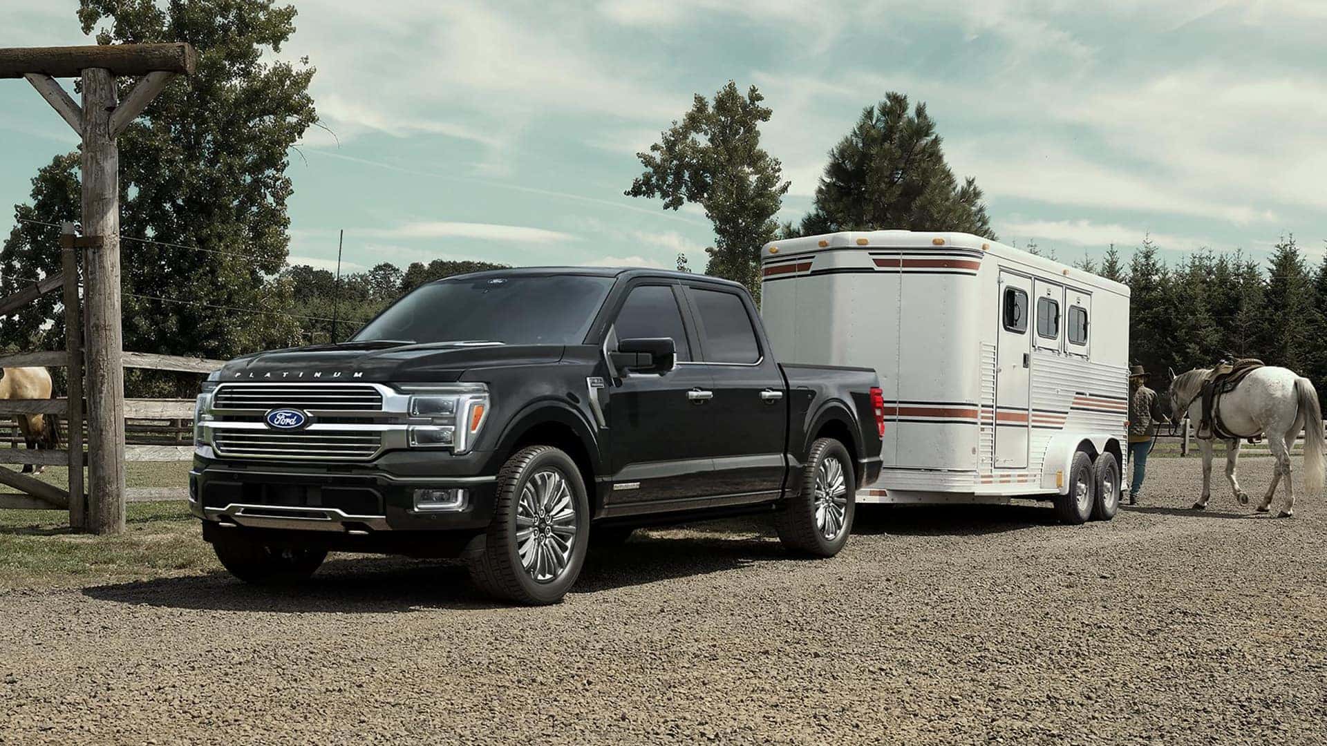 2026 Ford F 150 with trailer on the back and view of horses