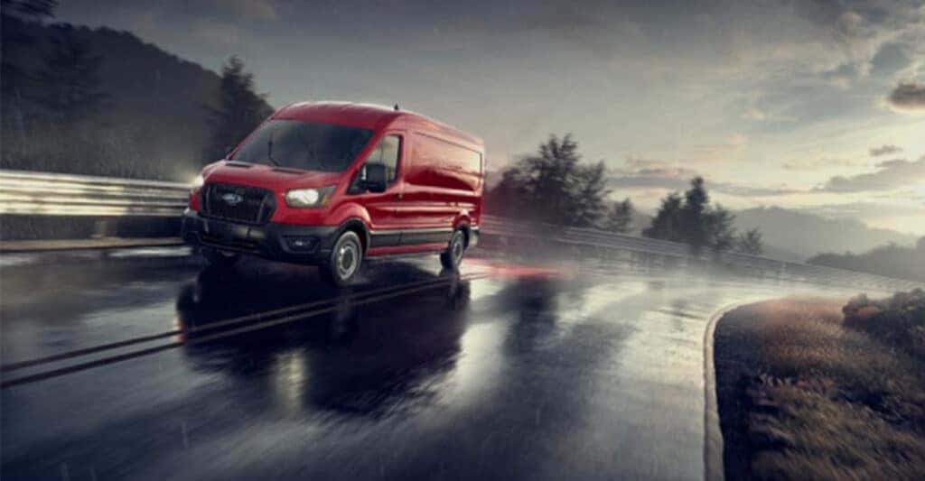 Ford-Transit-in-red-driving-in-the-rain