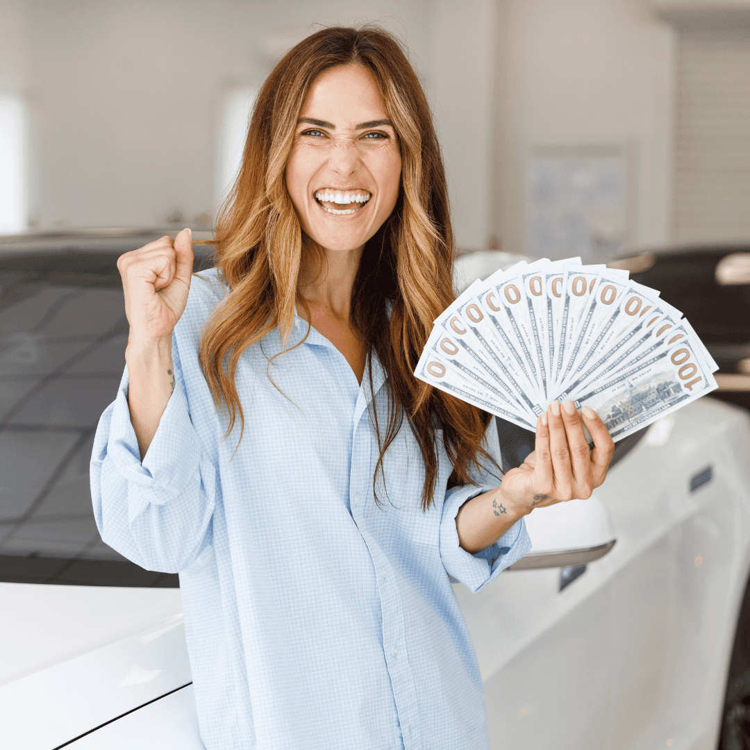 happy lady who just sold her car to Susquehanna Ford