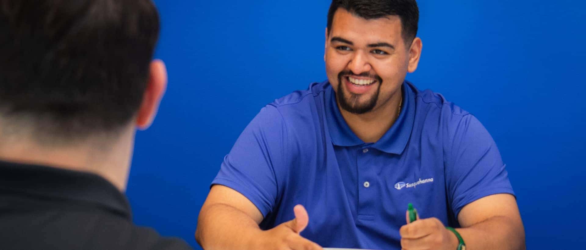 alejandro talking to customer