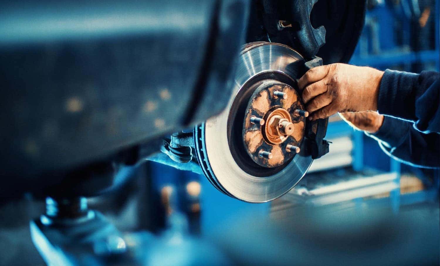 Mechanic working on brakes