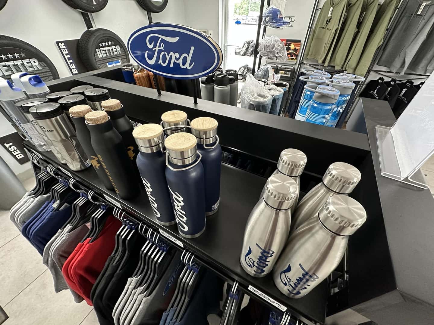 photo of beverage bottles and t-shirts at Winner Ford Cherry Hill